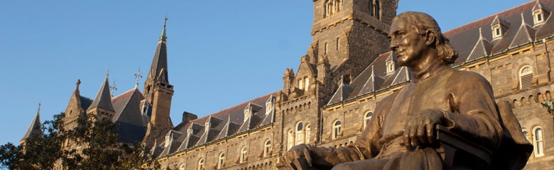 Image of a statue at the front of Georgetown's University Campus