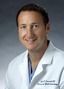 John Carroll, M.D.