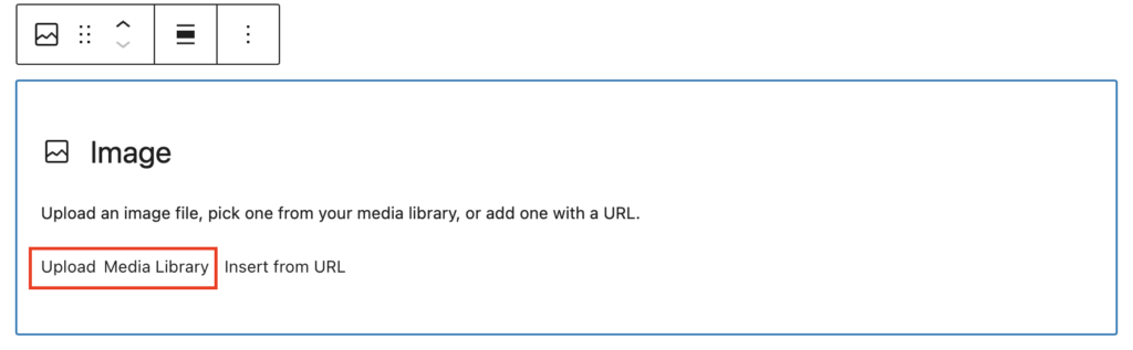 View of a blank image block in the WordPress editor with the Upload and Media Library options highlighted in a red box.