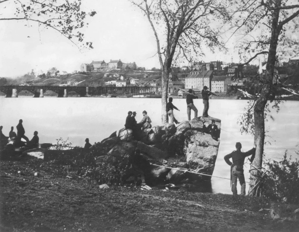 Civil War soldiers on the banks of the Potomac Rover across from Georgetown