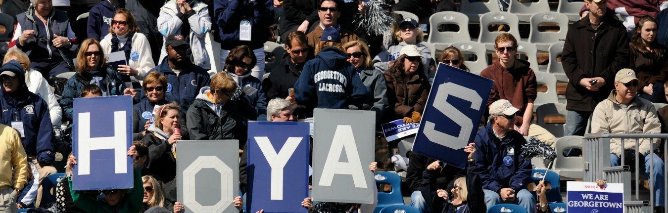 Hoyas Sign at Sporting Event
