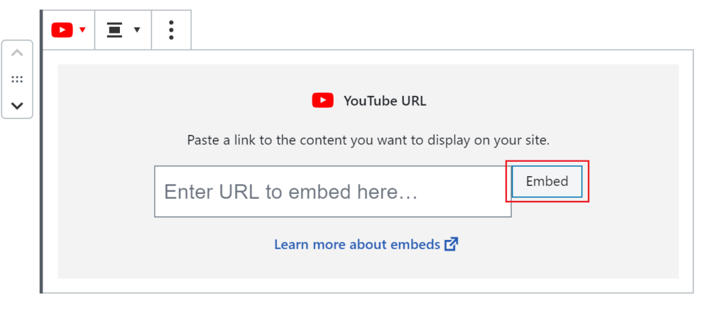 Youtube embed block in the editor with the block’s embed button outlined in red.
